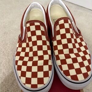 Vans women’s Rust and White Checkered Slip-On Sneakers